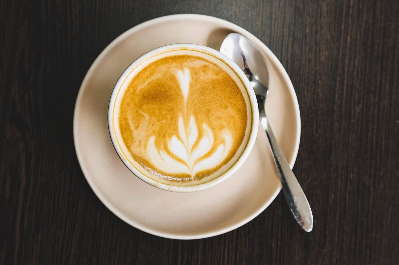 A flat white with latte art